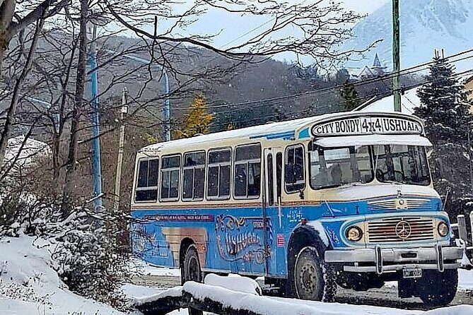 Exploring Ushuaia: Double Decker Bus Tour - Getting on board: meeting point, seats, and how audio works