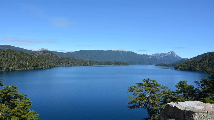 From Bariloche: San Martin de los Andes and 7 Lakes Circuit - Lake Machónico: Dark Blue Calm Between Mountains