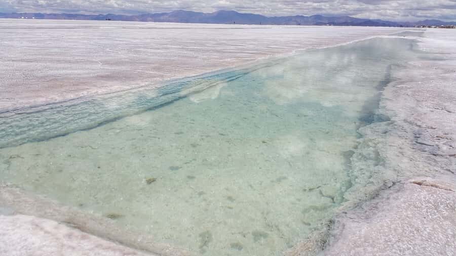 From Jujuy: Salinas Grandes, Purmamarca & Los Colorados Hike - Salinas Grandes view time: the white salt plain against the sky