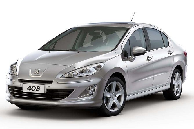 Private Airport Transfer in or out with english speaking driver. - Where you meet: Recoleta Cemetery and the airport main hall